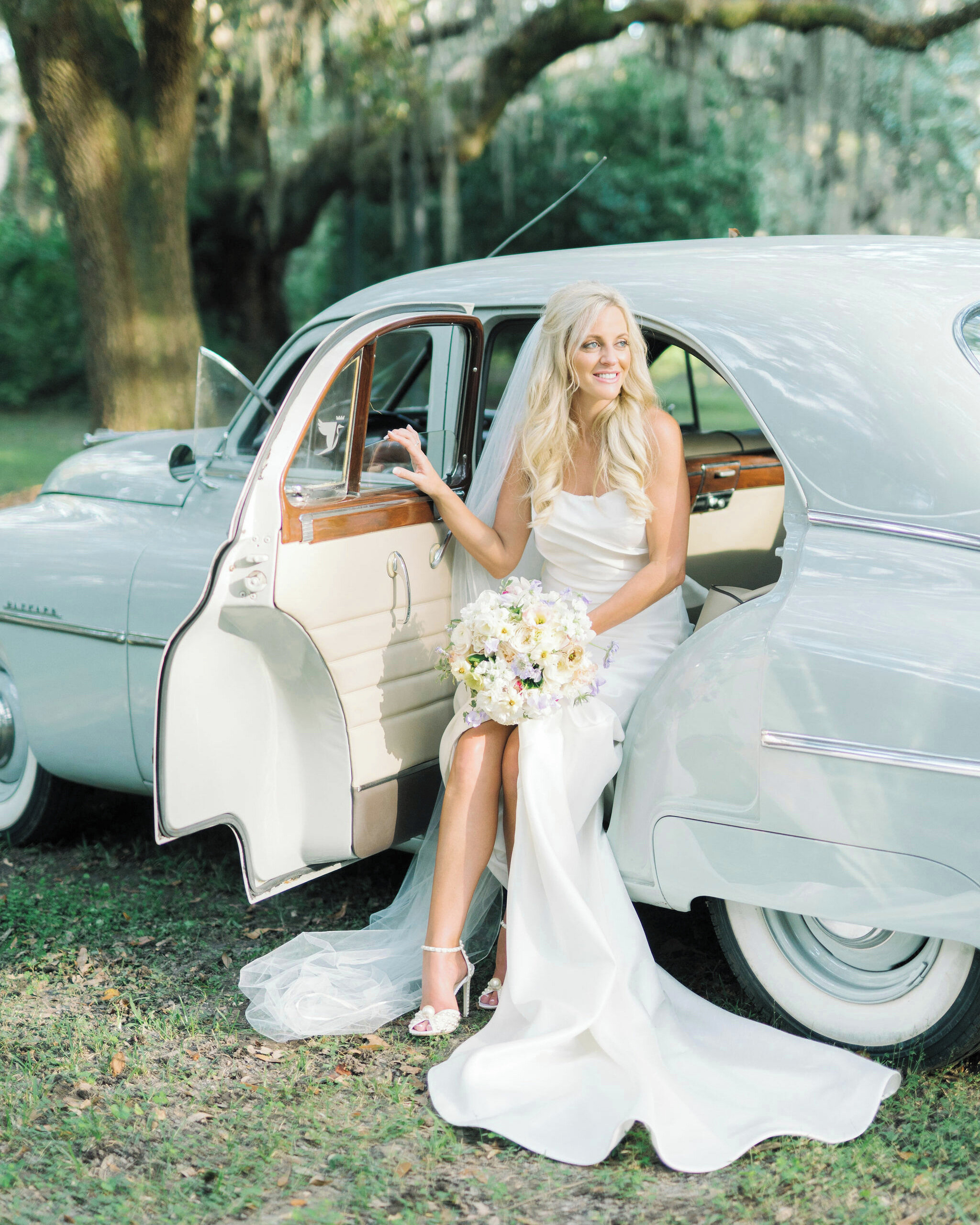 Heather looking gorgeous stepping out of this vintage car moments before the ceremony  @aaronandjillian